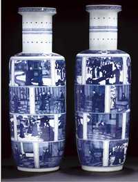 20th century A pair of blue and white rouleau vases